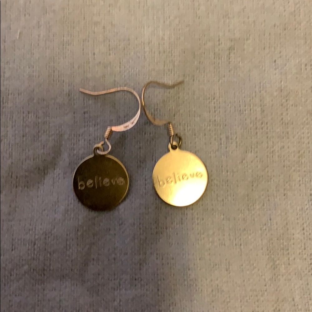Silver “believe” earrings